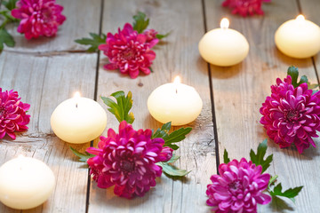 Obraz na płótnie Canvas Spa theme with candles and flowers