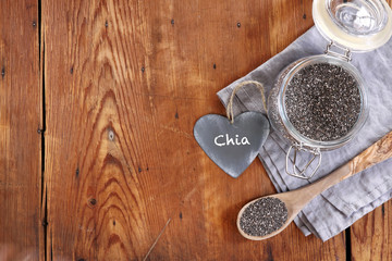 chia seeds and wooden background