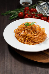 Spaghetti with tomato sauce, vertical