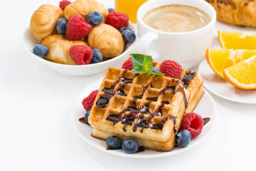 traditional sweet waffles for breakfast on white table