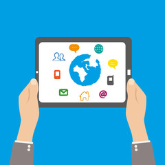 Tablet in hands with social media icons