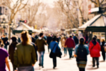 defocused blur background of people walking