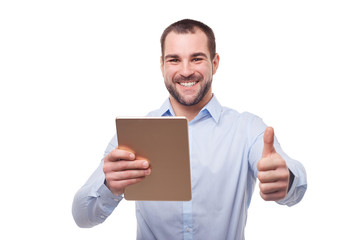 Man with tablet makes a gesture thumb up