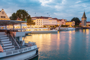 Fototapeta premium LINDAU, GERMANY - Lighthouse at port of Lindau harbour, Lake Constance, Bavaria