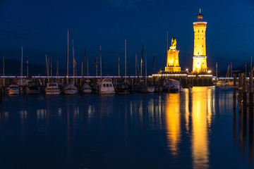 Fototapeta premium LINDAU, GERMANY - Lighthouse at port of Lindau harbour, Lake Constance, Bavaria