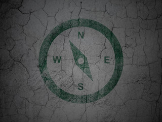 Fototapeta na wymiar Travel concept: Compass on grunge wall background