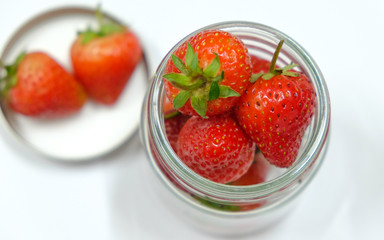Strawberries in bottle background