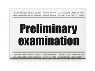 Studying concept: newspaper headline Preliminary Examination