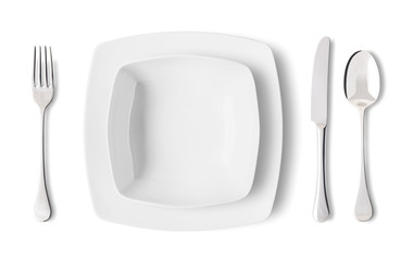 Place setting with plates, fork, knife and spoon - Posto a tavola con piatti, forchetta, coltello e...