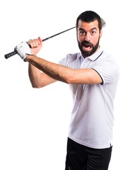 Golfer giving a hit