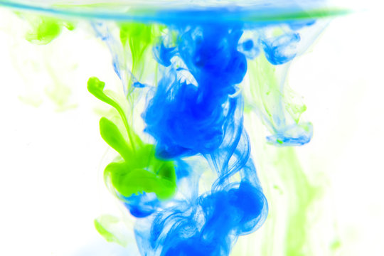 Vibrant color splashes in water.