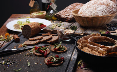 Grain bread and different spices on the table..