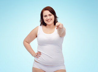 Obraz na płótnie Canvas plus size woman in underwear showing