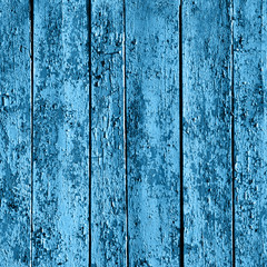 Fototapeta na wymiar Old wooden painted blue rustic background, paint peeling.