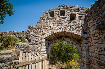 Main gate to old ruined fortress in Sutomore, Montenegro