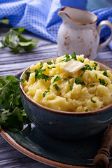 Mashed potatoes in blue bowl