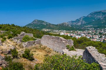 Ruined fortress walls and Sutomore town view from the hills