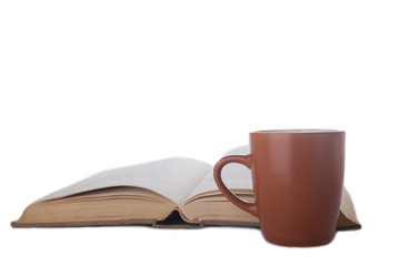book and cup of coffee isolated on white background