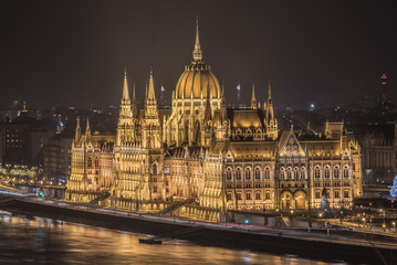 Fototapeta na wymiar Illuminated Hungarian Parliament Building in Budapest, Hungary at Night