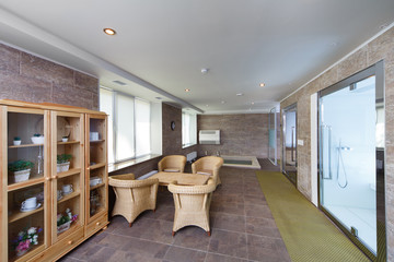 Interior of sauna with a swimming pool and a place to relax