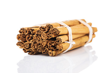 Cinnamon sticks isolated on white