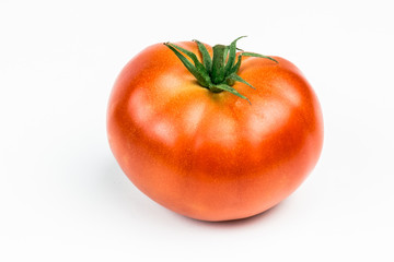 Tomatoes. Whole and a half isolated on white