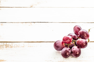 Grapes on a wood background