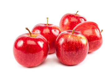 Fresh red apples on white background.