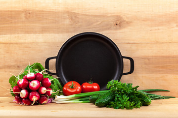 Fresh vegetables and pan.