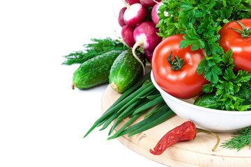 Fresh vegetables on a white background.