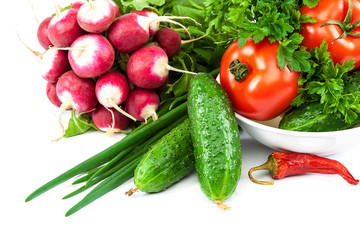 Fresh vegetables on a white background.