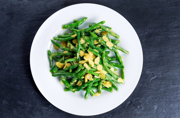 Green beans roasts garlic and flaked almond