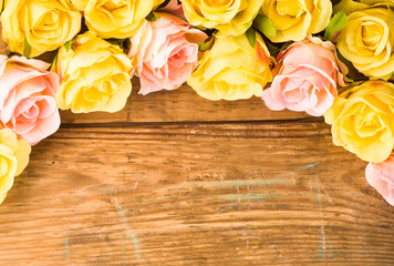 Colorful roses on wood