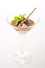 exclusive coffee dessert with ice cream in martini glass and mint leaf on white background, product photography for restaurant