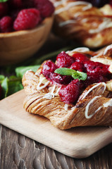 Sweet homemade cake with fresh berry and mint