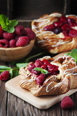 Sweet homemade cake with fresh berry and mint