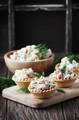 Traditional russian salad Olivier served in tartlet
