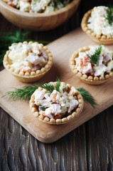 Traditional russian salad Olivier served in tartlet