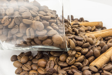 coffee beans, cinnamon on a white background
