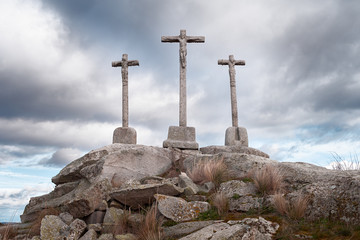stone cross with sky background dusk cloudy
