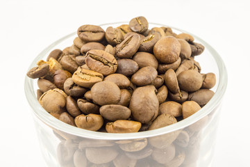 coffee beans, cinnamon on a white background
