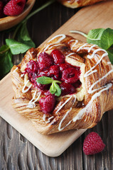 Sweet homemade cake with fresh berry and mint