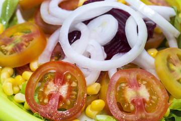 fresh vegetable salad tomato onion and lettuce