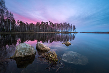 beautiful sunset on the lake with a textured foreground