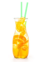 fresh tropical or summer lemonade with orange and ice in glass, beverage isolated on white background