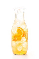 fresh tropical or summer lemonade with orange and ice in glass, beverage isolated on white background