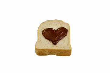 slice bread with heart shape of chocolate hazelnut spread top view, isolated on white background.