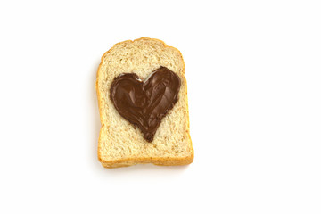 Slice bread with heart shape of chocolate hazelnut spread Top view, isolated on white background.