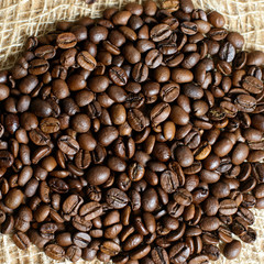 Roasted brown coffee beans, can be used as a background and texture