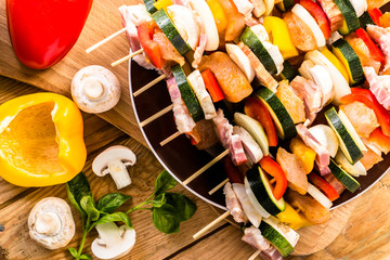 Shish kebab with chicken, becon and vegetables prepared for grill